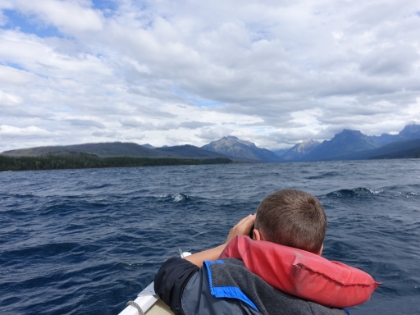 Kyle on the bow with the binoculars.