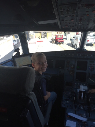Kyle got to sit in the pilot's seat, push buttons on the console, and chat for quite a while with the pilot and co-pilot. The pilot even asked if he wanted to make an announcement over the loudspeaker. Kyle passed on that offer, but this was definitely a great way to end a fantastic trip!