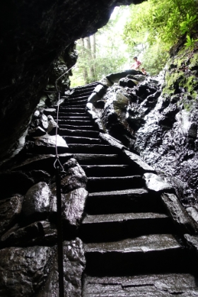 Stone stairway heading up through the rock.