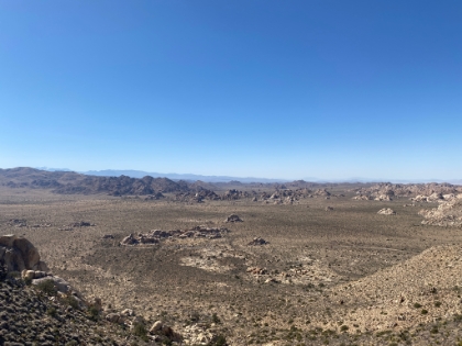The valley floor below looks like a moonscape.