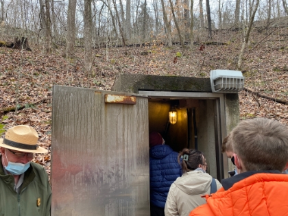 The entrance looks like you're descending into a bomb shelter. Each area of the cave system used to be owned by a different private owner. The owners fought for years over tourist business. The fights led to actual physical confrontation, armed guards, destroying formations in rival caves, and of course lots of lawsuits. This time period was known as the "Kentucky Cave Wars". Fortunately, things are a little calmer now under the National Park system.