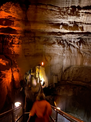Cutting across a giant vertical shaft and into a neighboring tunnel.