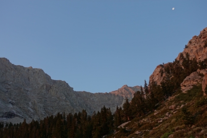 The moon was still high overhead as the granite was washed in the reddish glow of sunrise.