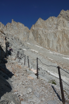Always tough to tell slope in the pictures, but that's a steep drop that the railing is protecting against. Probably a treacherous traverse in the winter.