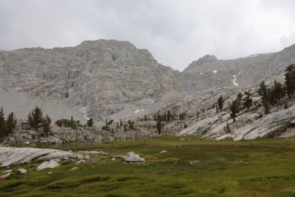 The lake is pretty small at the moment, but the bowl is nice and green. This is the end of the official trail. The weather is still borderline, and I'm a little worried about scrambling up the off-trail rock pile to make it to Meysan Lake.