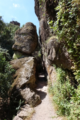 The trail gets narrow in places as it squeezes through the talus rocks.