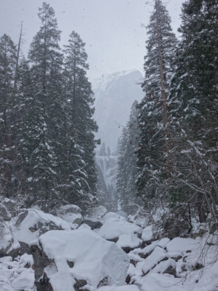 The first views of Vernal Fall from the footbridge as it starts to snow heavily.