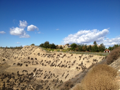 A look back down at the trail climbing up the bluffs to the New Millenium enclave.