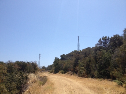 The towers that were once tiny are now at-hand. Over halfway up to the ridge.