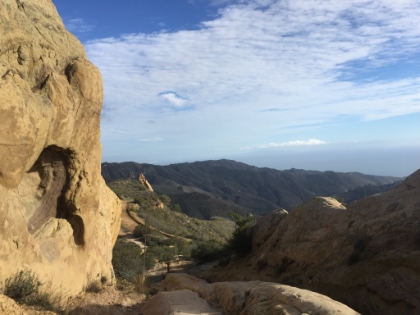 The rock formation area at the top.