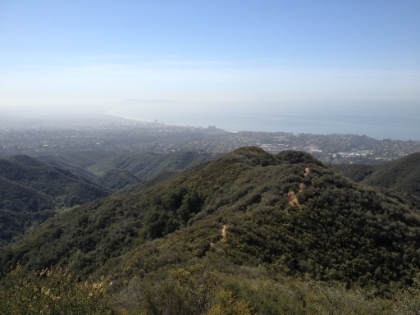 Looking at the trail heading down the ridge. The hill in the middle way down the canyon on the left is the first peak from earlier.