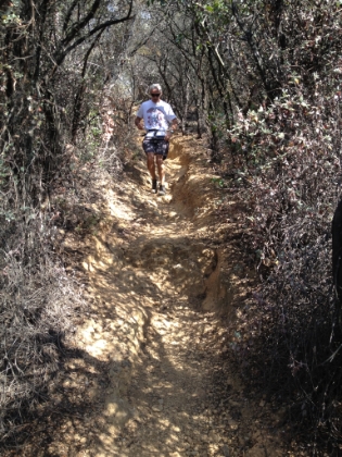 Dr. Rock coming down a very technical section of trail.