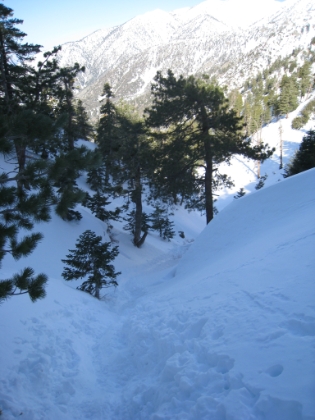 Almost at the saddle. Looking down the steep ascent the last little ways to the ridge. The trail cuts a chute right down the valley. And it looks like a few people have slid down it. I did as well on the way back.