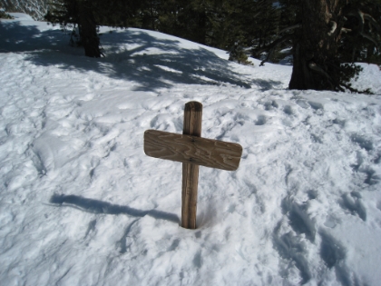 A blank sign marking the peak. Doesn't instill much confidence.