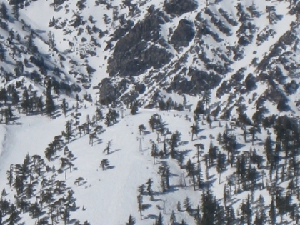 Sure enough! As soon as I hit the ridge, I realize that I wasn't imagining it. Here is the source of the sounds and smells. The Mt. Baldy ski resort in the far distance. This is a 15x zoomed-in view. You can see the ski-lifts and the little dots skiing down the slopes. And you can hear human sounds very clearly, though it is at least a few miles away. I also see a set of snowshoe tracks coming up from that direction. I saw online that people take the ski-lift up to Mt. Baldy notch and then snowshoe from there. That should be illegal!