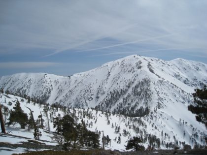 A look at the final couple miles of trail to the summit. The wind is howling now, it's getting cold, and it's getting late. I had decided that 2:00pm would be a nice, safe turn around time, 3:00pm would be really pushing it, and 4:00pm would be stupidity. It's already 3:30pm.