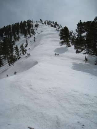 Like usual, this picture does not come remotely close to conveying the slope here. This is extremely steep. And the top here is not really the summit, there are a couple more short inclines after that. It's getting really windy and really cold. It's about 4:00pm now. There have only been a couple times so far on my treks where I almost gave up. This was one of them. I was exhausted. And I realized now that I might be coming down in the dark. But there was no way I was getting this close and not summiting.