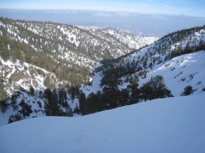 The view from where I stopped my butt slide. Maybe 20' from a drop-off of a couple hundred feet. At this point, I am officially no longer having fun, and am getting a bit scared of this downhill business!