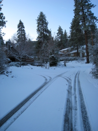 So, I'm, out eating dinner at 7:00pm the night before the hike thinking it was going to be a warm weekend (it had been unseasonably warm all week). Curious to see just how warm it was supposed to be, I check the weather forecast on my iPhone. Forecast... high of 36 degrees with snow!! What the heck??? Talk about a dramatic change of plans. Do I cancel, or do I still go? I had 2 hours until the stores closed to stock up on some warm gear. I started a mad dash to find new tire chains, hit up Sports Chalet for gloves, beanie, etc. Found everything I needed. Hell ya I'm going!! Hmm, more snow than I thought there was going to be. I almost needed the new chains I bought. And I almost slid off the road. Temperature is exactly 32 degrees. I'm afraid to park too far away from the Highway, so I park in front of a little cafe. I hope they don't tow the car. I put on another layer of clothes, pack up my gear, and head out. Elevation 5995'. Time 7:05am.
