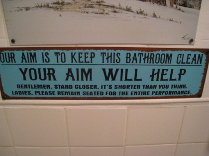 An amusing sign in the bathroom at the cafe, and the end of my trip.