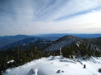 More pics. There is a set of snowshoe prints up here that evidently come from the tram. Booo. Taking the tram to the top should be illegal.