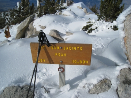 I made it! 10,804' above sea level. The temperature is in the low 40's, not all too windy, pretty comfortable up here actually. The only problem is it's 2:15pm! It will be dark in less than 3 hours, and it took me almost 7 hours to get here! Now if I were trail running the whole way down, 2:1 time would be realistic. But hiking down in the snow with no trail? It hits me that I might be spending the night on the trail somewhere.